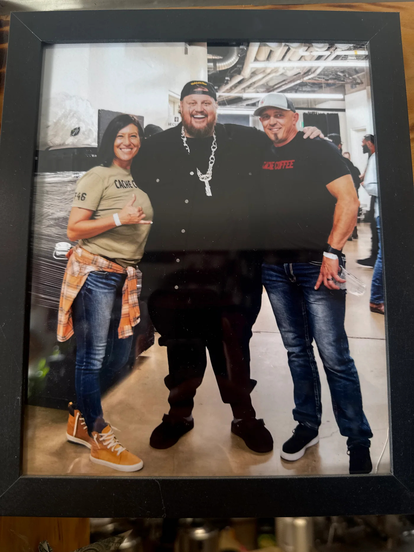 Jamie and Mindie Buttars backstage with Jelly Roll at a Salt Lake City concert in 2024